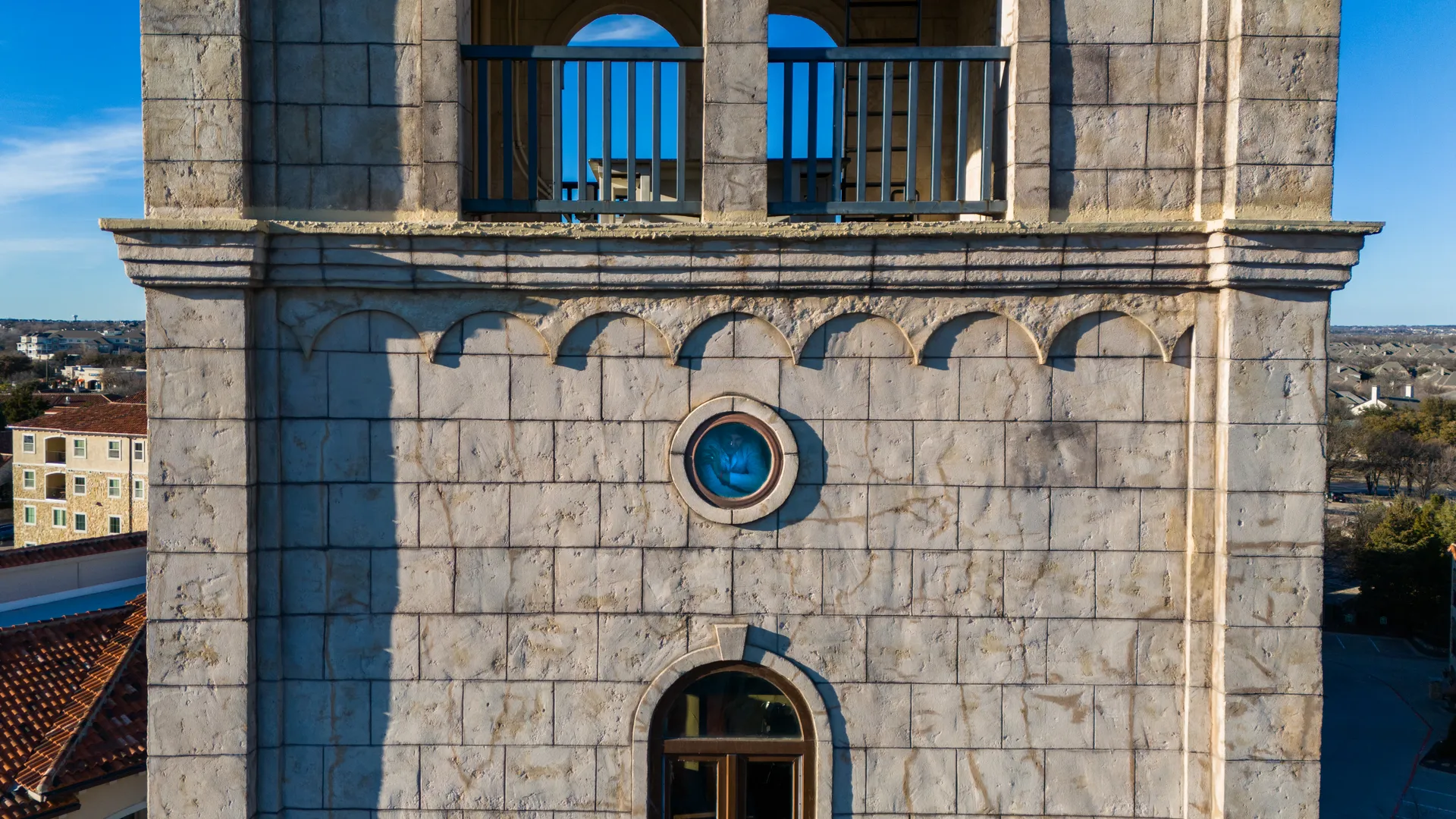 Jeffory D. Blackard in the bell tower window at Adriatica Village